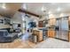 Open kitchen features stainless steel appliances and granite countertops at 5301 E Mitchell Dr, Phoenix, AZ 85018