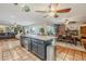 Spacious kitchen with granite countertops, island, and stainless steel appliances at 5301 E Mitchell Dr, Phoenix, AZ 85018