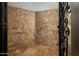 Spacious walk-in shower featuring stunning tile flooring and walls at 5427 E Wonderview Rd, Phoenix, AZ 85018