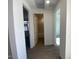 Hallway with doors to bedrooms and bathroom at 7226 E Purple Prairie Dr, San Tan Valley, AZ 85143