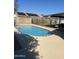 Rectangular pool with flagstone decking at 7416 W Via Montoya Dr, Glendale, AZ 85310