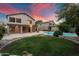 Home with a large backyard, sparkling pool, and covered patio at 7447 E Christmas Cholla Dr, Scottsdale, AZ 85255