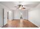 Bright bedroom with hardwood floors and access to bathroom at 7447 E Christmas Cholla Dr, Scottsdale, AZ 85255