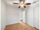 Spacious bedroom featuring wood floors and ceiling fan at 7447 E Christmas Cholla Dr, Scottsdale, AZ 85255