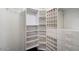 Well-organized walk-in closet with ample shelving at 7447 E Christmas Cholla Dr, Scottsdale, AZ 85255