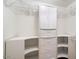 Large walk-in closet with custom shelving and drawers at 7447 E Christmas Cholla Dr, Scottsdale, AZ 85255