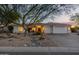 Beautiful desert landscape enhances this home's curb appeal at 8713 E Voltaire Ave, Scottsdale, AZ 85260