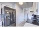 Kitchen with black appliances and white cabinets at 9710 W Rodeo Ct, Sun City, AZ 85373