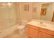 Bathroom featuring a shower, toilet, and vanity at 1041 N 91St Pl, Mesa, AZ 85207