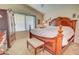 A bedroom with a king size bed and a chair at 1041 N 91St Pl, Mesa, AZ 85207