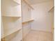 A closet with shelves at 1041 N 91St Pl, Mesa, AZ 85207