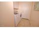 A laundry room with a washer and dryer at 1041 N 91St Pl, Mesa, AZ 85207