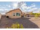 Backyard view of home with desert plants at 10454 E Peralta Canyon Dr, Gold Canyon, AZ 85118