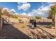 Desert landscaping with grilling area and patio at 10454 E Peralta Canyon Dr, Gold Canyon, AZ 85118