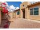 Home's side yard with a gate and desert landscaping at 10454 E Peralta Canyon Dr, Gold Canyon, AZ 85118