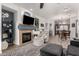 Bright and airy living room with fireplace and open floor plan at 10454 E Peralta Canyon Dr, Gold Canyon, AZ 85118