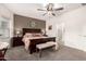 Main bedroom with ensuite bathroom and ceiling fan at 10454 E Peralta Canyon Dr, Gold Canyon, AZ 85118