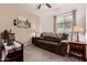 Cozy sitting room featuring a comfortable sofa and side tables at 10454 E Peralta Canyon Dr, Gold Canyon, AZ 85118