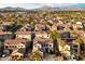 Aerial view showcasing a large community with mountain views at 10730 E Medina Ave, Mesa, AZ 85209