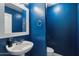 Small bathroom with white sink and blue walls at 10730 E Medina Ave, Mesa, AZ 85209