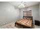 Bedroom with wood flooring and ceiling fan at 10730 E Medina Ave, Mesa, AZ 85209