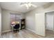 Bright bedroom with wood floors and workspace at 10730 E Medina Ave, Mesa, AZ 85209