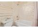 Bathroom with a shower and tub, and beige tile at 10921 W Bermuda Dr, Avondale, AZ 85392