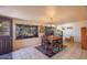 Cozy dining area featuring a rustic table and abundant natural light at 11008 W Cherry Hills W Dr, Sun City, AZ 85351