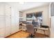 Functional home office featuring built-in storage and a bright window view at 11008 W Cherry Hills W Dr, Sun City, AZ 85351