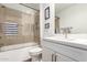 Clean bathroom with a tub/shower combo, toilet and vanity at 11673 N 136Th St # 1021, Scottsdale, AZ 85259