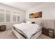 Spacious bedroom with plush bedding and modern nightstand at 11673 N 136Th St # 1021, Scottsdale, AZ 85259