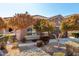 Single-story home with landscaping and trees at 12021 W Locust Ln, Avondale, AZ 85323