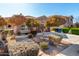 Single-story home with landscaping and trees at 12021 W Locust Ln, Avondale, AZ 85323