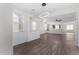 Bright and airy living room with hardwood floors at 12021 W Locust Ln, Avondale, AZ 85323