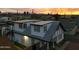 Two-story home with a rooftop deck, showcasing city views at 1521 W Garfield St, Phoenix, AZ 85007