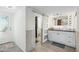 Modern bathroom featuring a vanity with a vessel sink and a walk-in shower at 1521 W Garfield St, Phoenix, AZ 85007