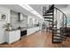 Modern kitchen with white cabinets, gray tile backsplash at 1521 W Garfield St, Phoenix, AZ 85007