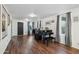 Bright living room with hardwood floors and a grand piano at 1521 W Garfield St, Phoenix, AZ 85007