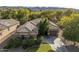 Single-story home with tile roof, two-car garage, and landscaped yard at 1523 E Constance Way, Phoenix, AZ 85042