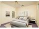 Main bedroom with gray platform bed and neutral decor at 1523 E Constance Way, Phoenix, AZ 85042