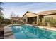 Relaxing backyard with a refreshing blue swimming pool at 1523 E Constance Way, Phoenix, AZ 85042