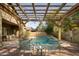 Enjoy this inviting poolside patio area at 1523 E Constance Way, Phoenix, AZ 85042