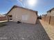 Desert landscape backyard with gravel and a covered patio at 1534 E Alba Dr, Casa Grande, AZ 85122