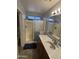 Bathroom with shower/tub combo and vanity with sink at 1534 E Alba Dr, Casa Grande, AZ 85122