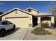 One-story house with two-car garage and landscaped front yard at 1534 E Alba Dr, Casa Grande, AZ 85122