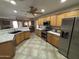 Spacious kitchen with stainless steel appliances and granite countertops at 1534 E Alba Dr, Casa Grande, AZ 85122