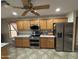 Spacious kitchen with stainless steel appliances and granite countertops at 1534 E Alba Dr, Casa Grande, AZ 85122