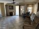 Bright and airy living room with tile flooring and access to backyard at 1534 E Alba Dr, Casa Grande, AZ 85122