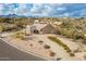 Aerial view of single story home with desert landscaping and driveway at 16548 E Emerald Dr, Fountain Hills, AZ 85268