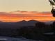 Sunset view of mountains in the distance at 16548 E Emerald Dr, Fountain Hills, AZ 85268